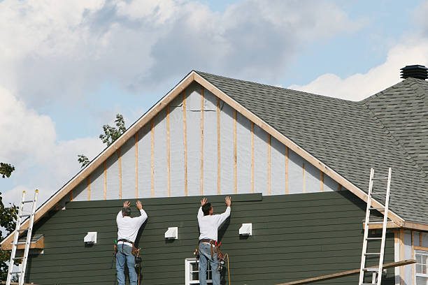 Professional Siding technician working in Butler, KY